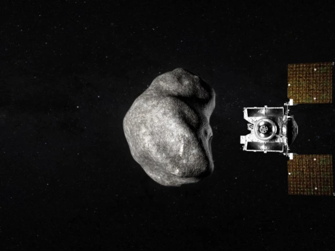 A spacecraft flies by an asteroid in the blackness of space